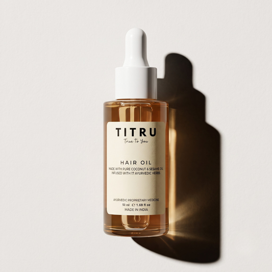 Titru Hair Oil in a dropper bottle – nourishing pre-wash hair oil
